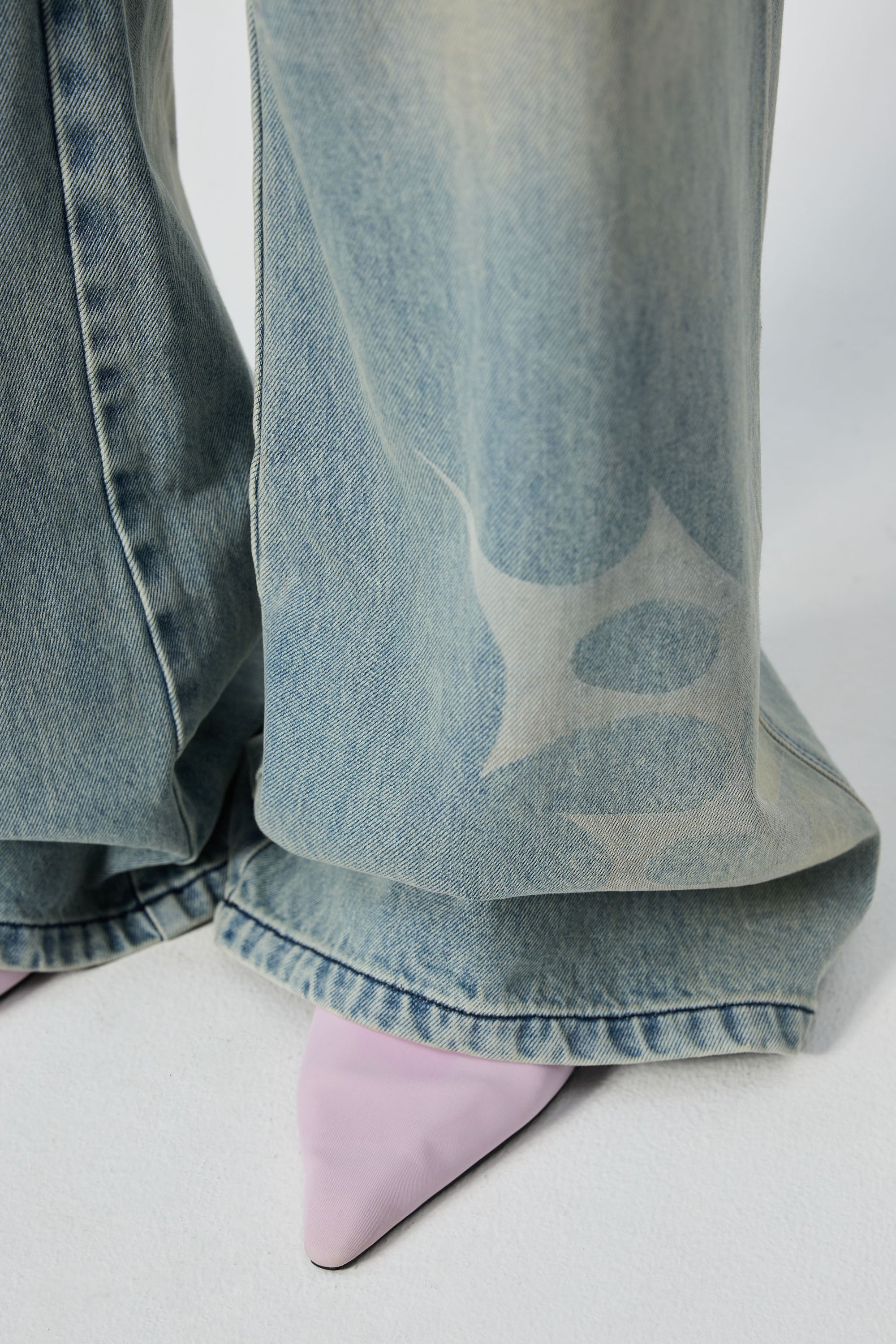 Arthur Apparel blue straight leg jeans with stars print