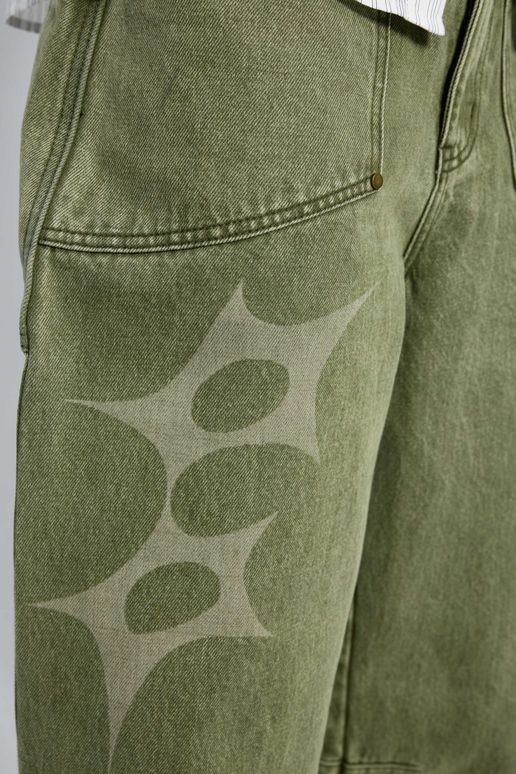 Arthur Apparel green straight leg jeans with stars print