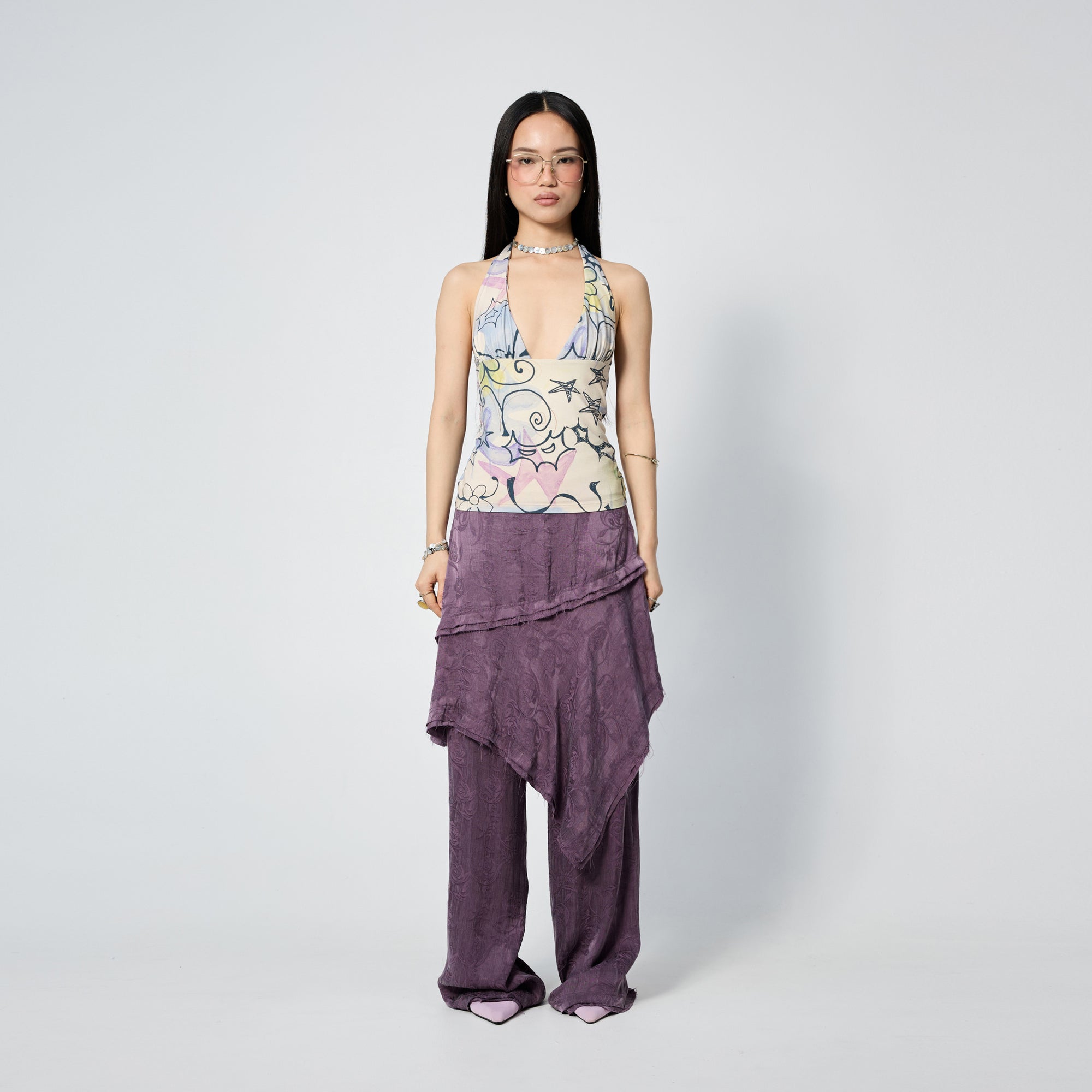 Arthur Apparel purple asymmetric skirt with frayed hem and roses print