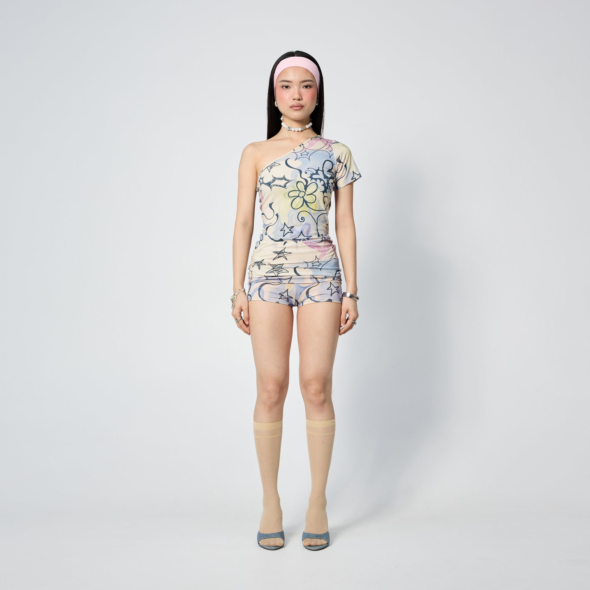 Arthur Apparel fitted mini short with purple stars print