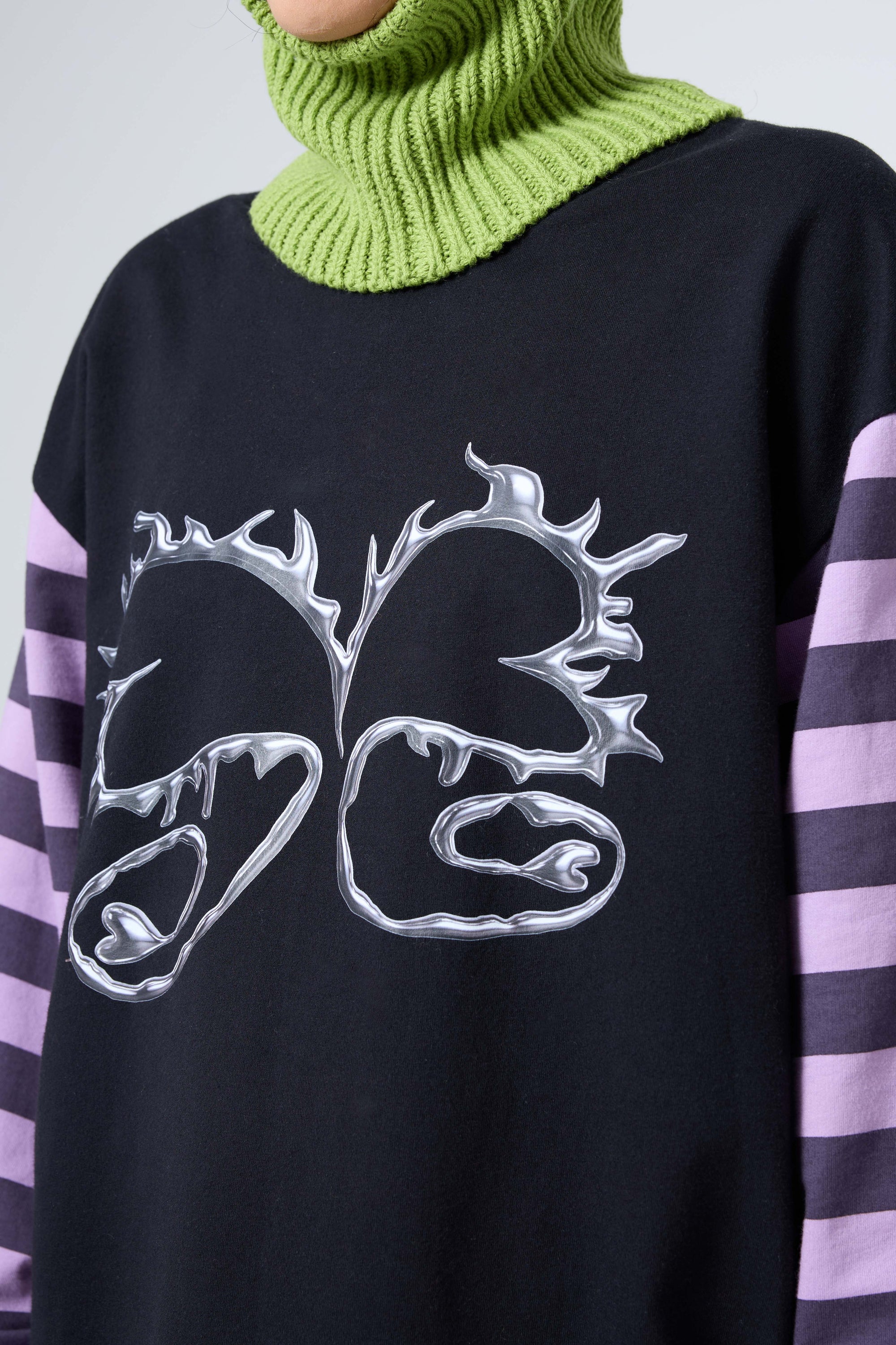 Arthur Apparel black long sleeve tshirt  with graphic silver heart print